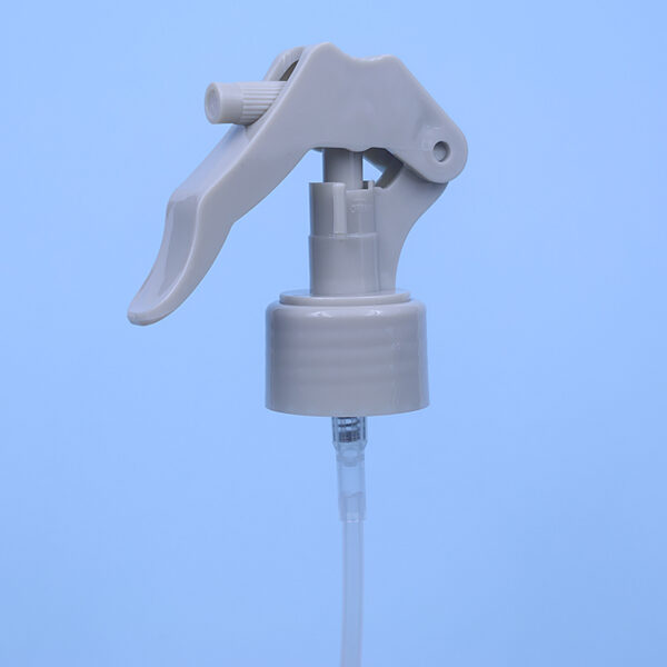 28/410  Mini spray gun in gray color with a toggle switch style.