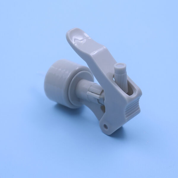 28/410  Mini spray gun in gray color with a toggle switch style. - Image 2